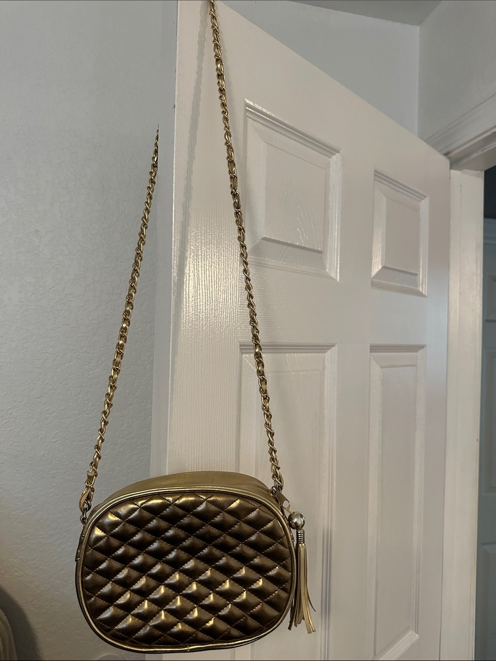 Quilted Metallic Gold Crossbody Bag with Tassel
